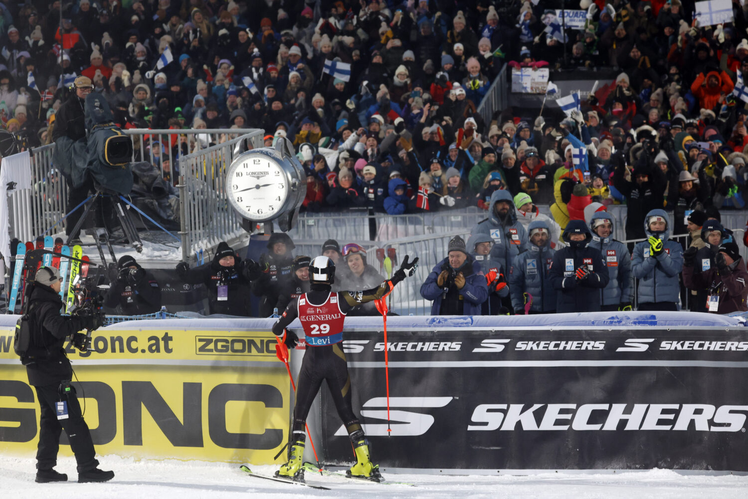 Eduard Hallberg of Team Finland celebrates at the Levi FIS Alpine Ski World Cup in front of the crowd.